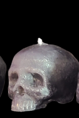Spooky mini little skull candle